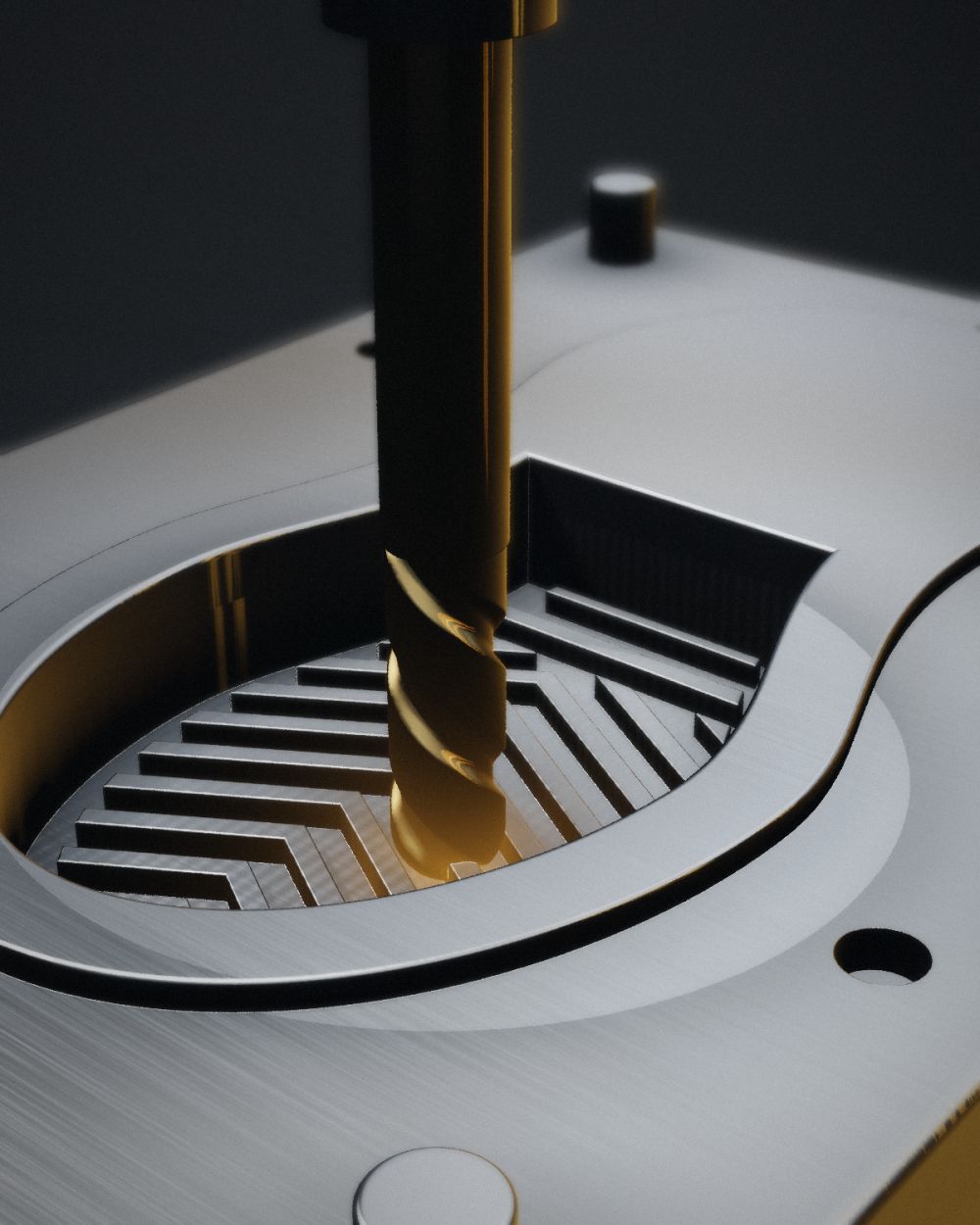 Gold-coated ball-nose end mill cutting a tread pattern into a mould